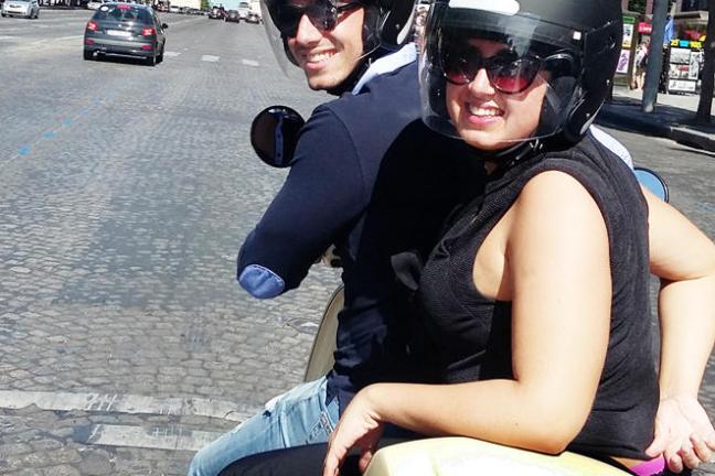 Man and woman on Vespa