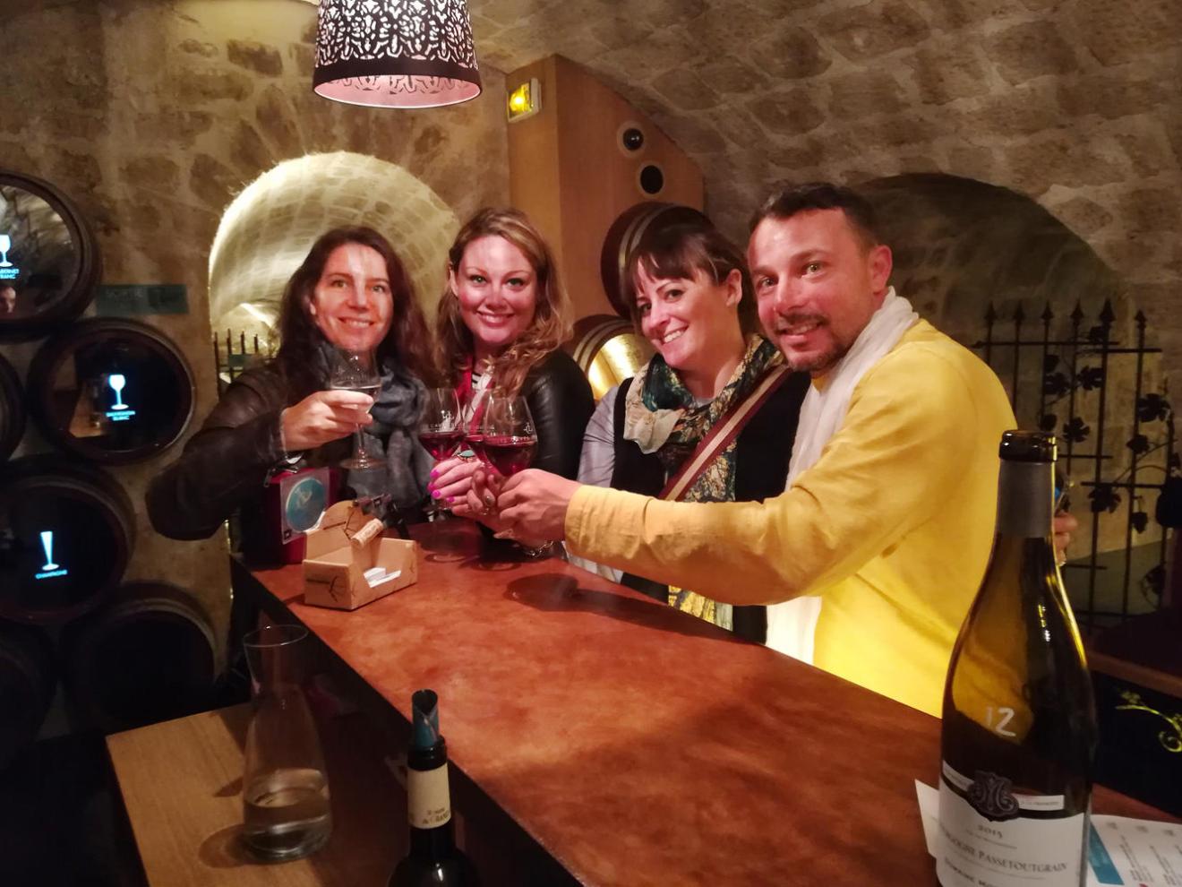 Group of people drinking in a bar