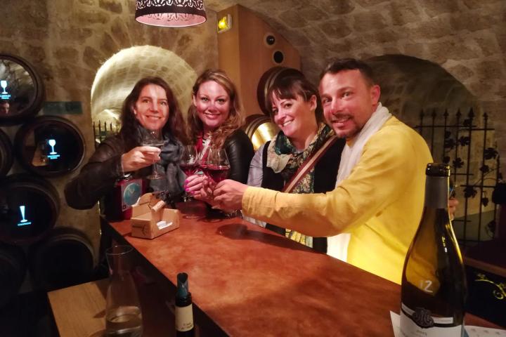 Group of people drinking in a bar