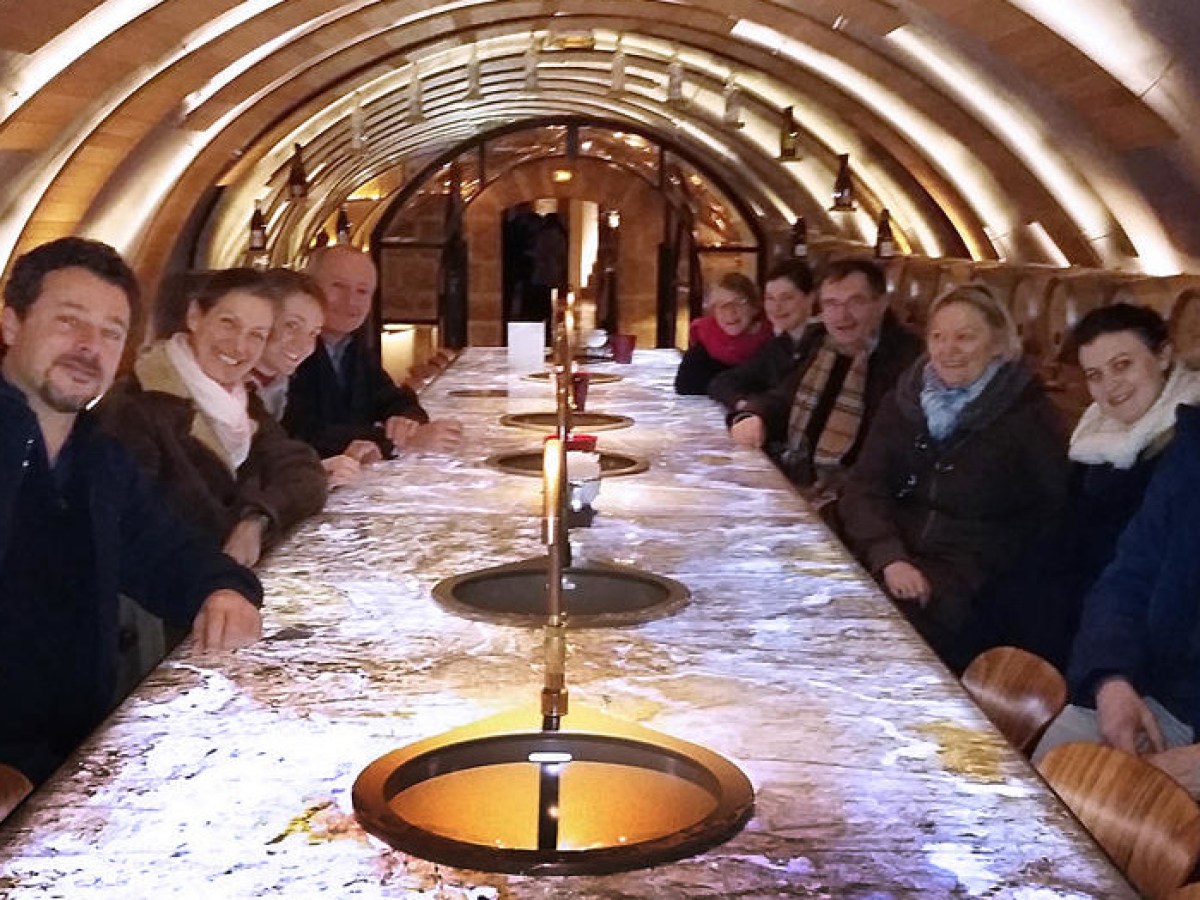 Group posing around a table