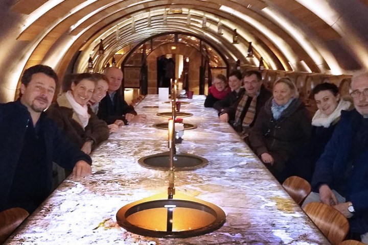 Group posing around a table