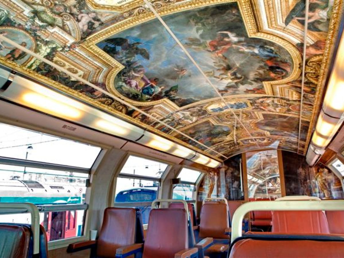 Tour bus with painting on ceiling