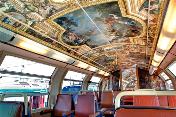 Tour bus with painting on ceiling