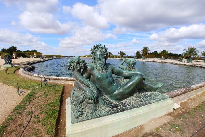 Versailles statue of man posing